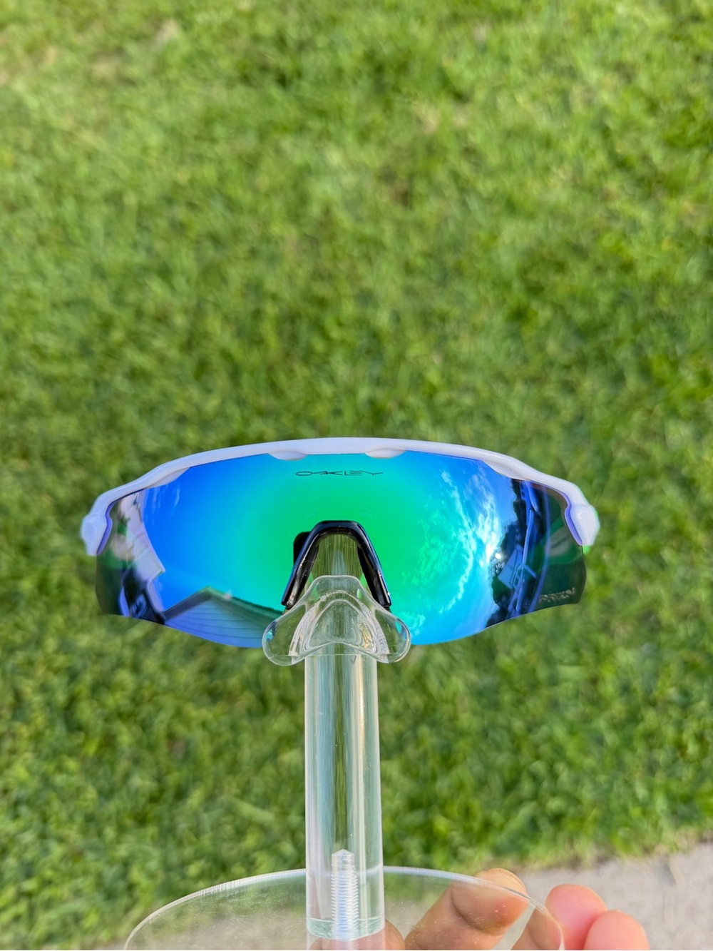 Oakley White Frame Sunglasses with Blue-Green Mirrored Lens